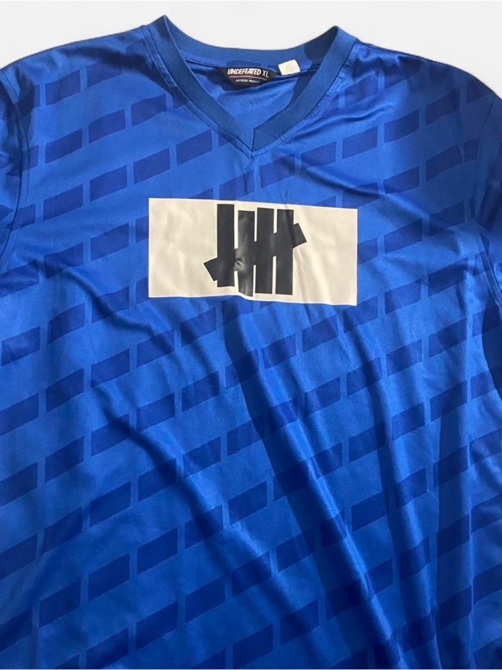 Undefeated Men’s Royal Blue Graphic V-Neck Jersey